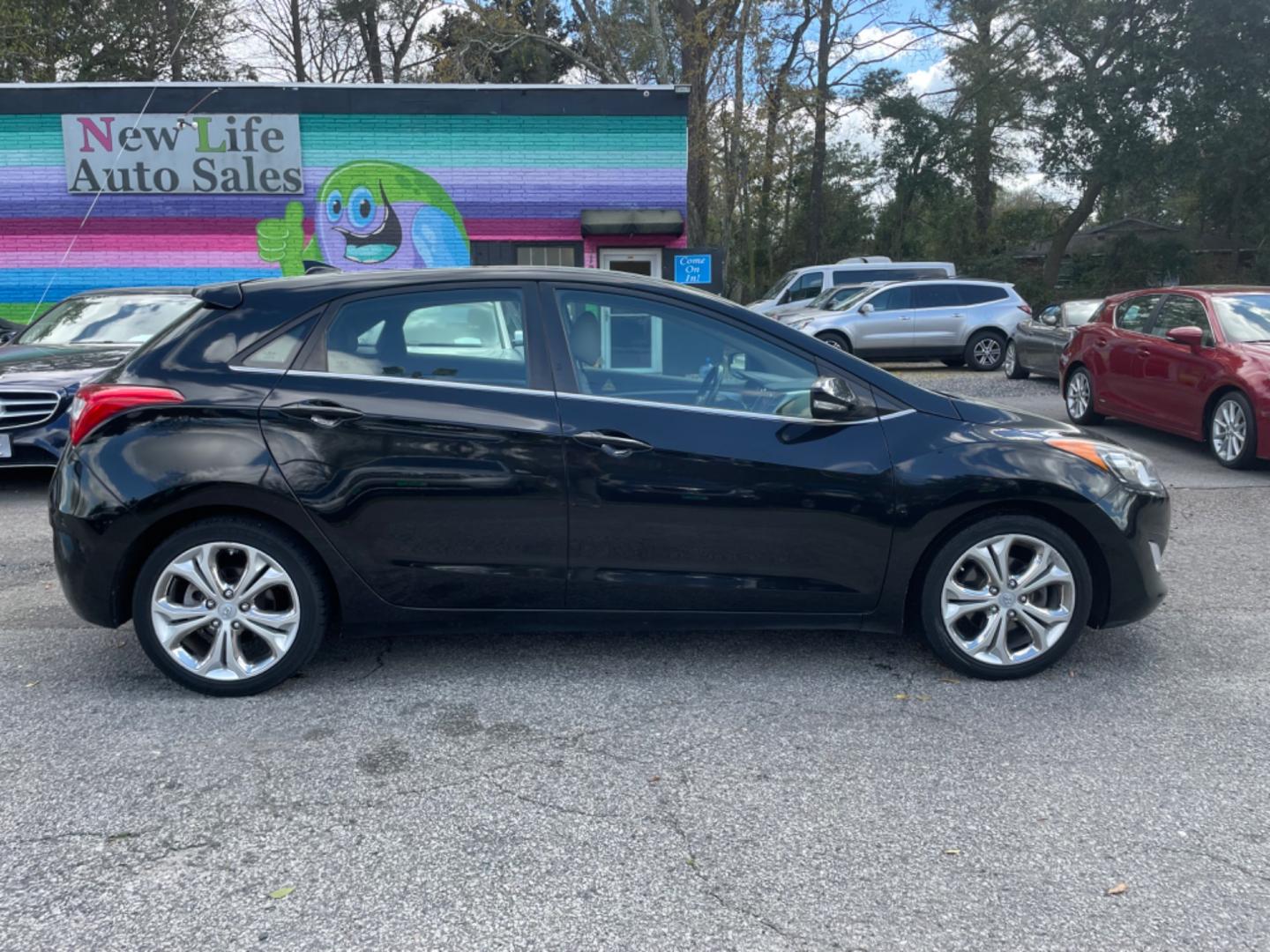 2014 BLACK HYUNDAI ELANTRA GT BASE (KMHD35LH8EU) with an 2.0L engine, Automatic transmission, located at 5103 Dorchester Rd., Charleston, SC, 29418-5607, (843) 767-1122, 36.245171, -115.228050 - Photo#8